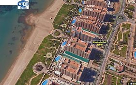 Apartamento 1ª Línea de mar en Marina d'Or con césped y playa [Familiar]